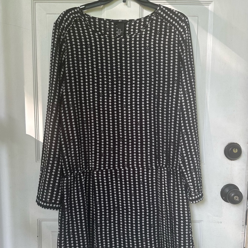 H&M Black mini dress with white stars pattern & long sleeves